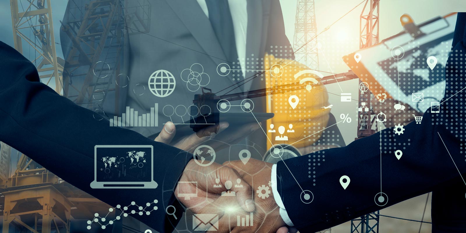 business owners shaking hands and discussing MEP services